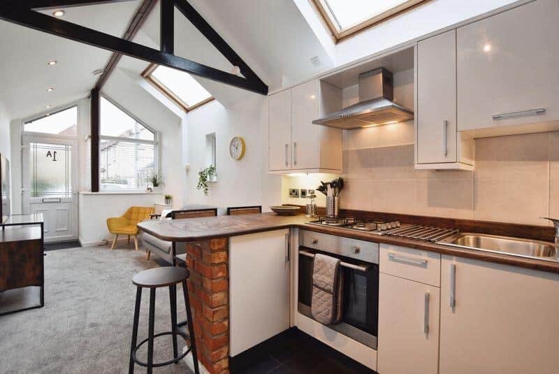 Open plan kitchen with breakfast bar