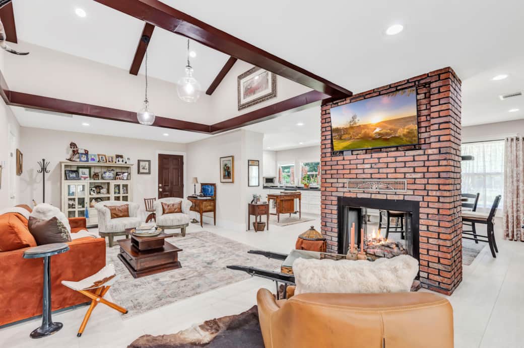 living room with double sided fire place