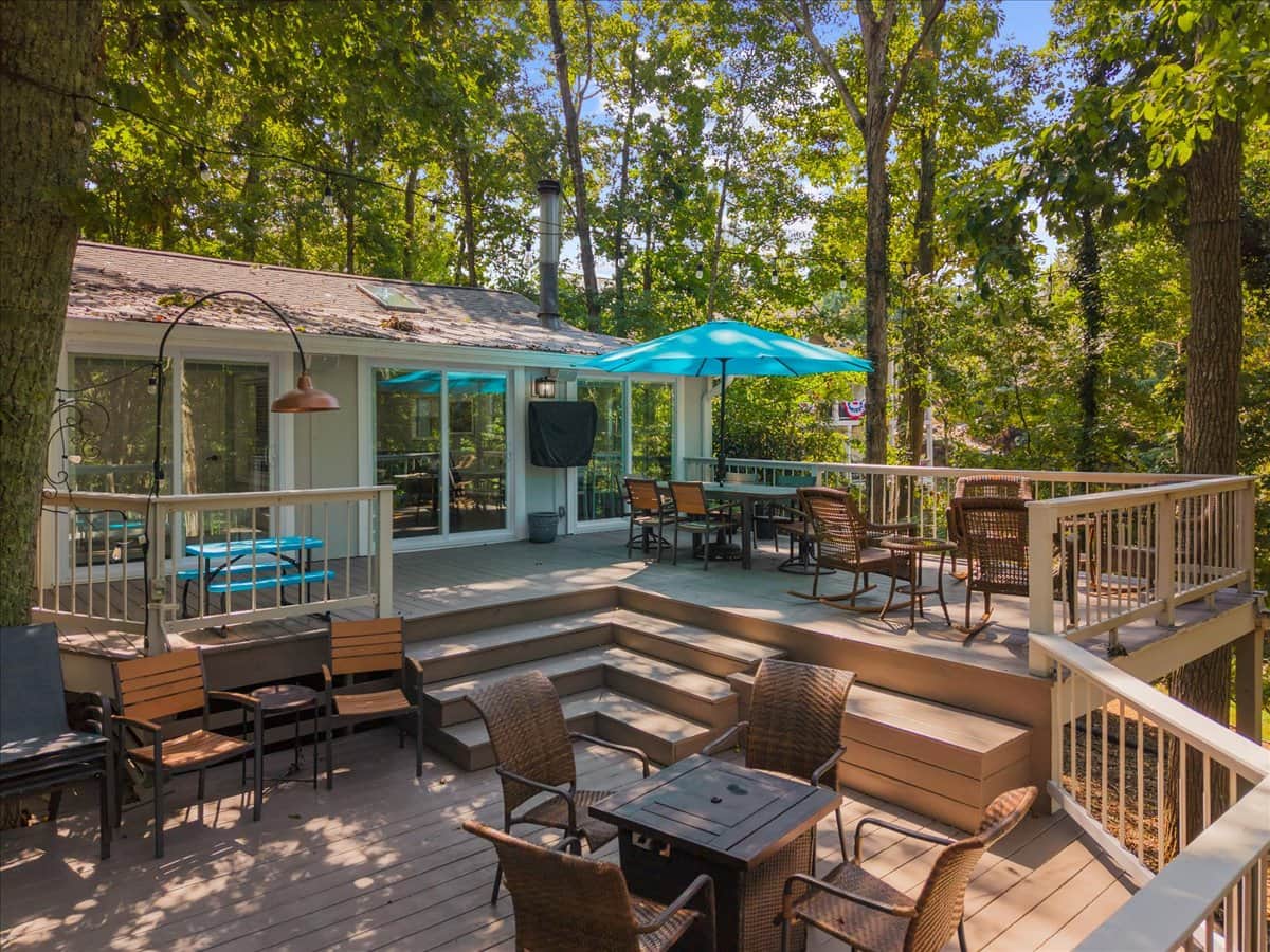 Enjoy this spacious deck surrounded by peaceful woods. It's the perfect spot for relaxing and dining