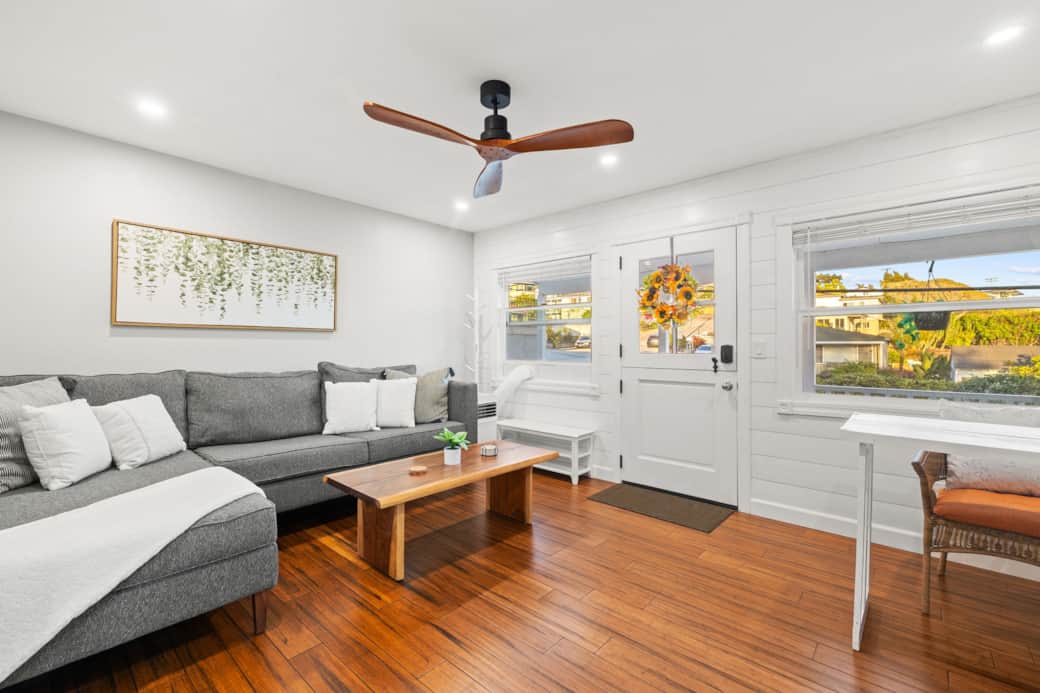 Bright and inviting living space with a charming Dutch door, tons of natural light.