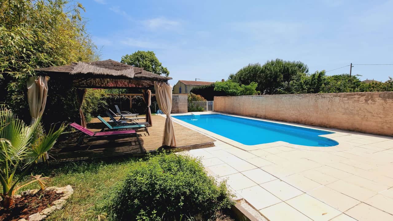 Private pool surrounded by greenery