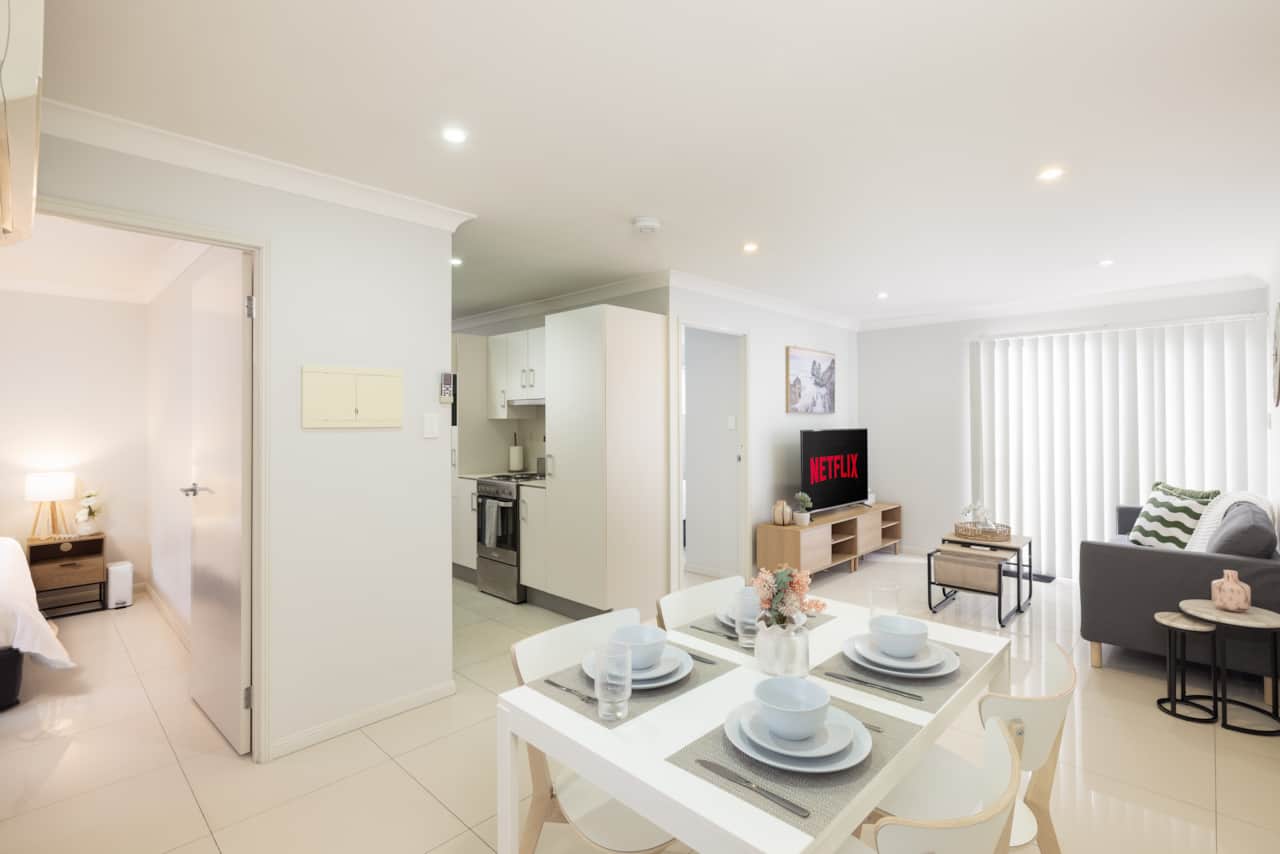 Dining Area: Integrated dining area within open living layout 
