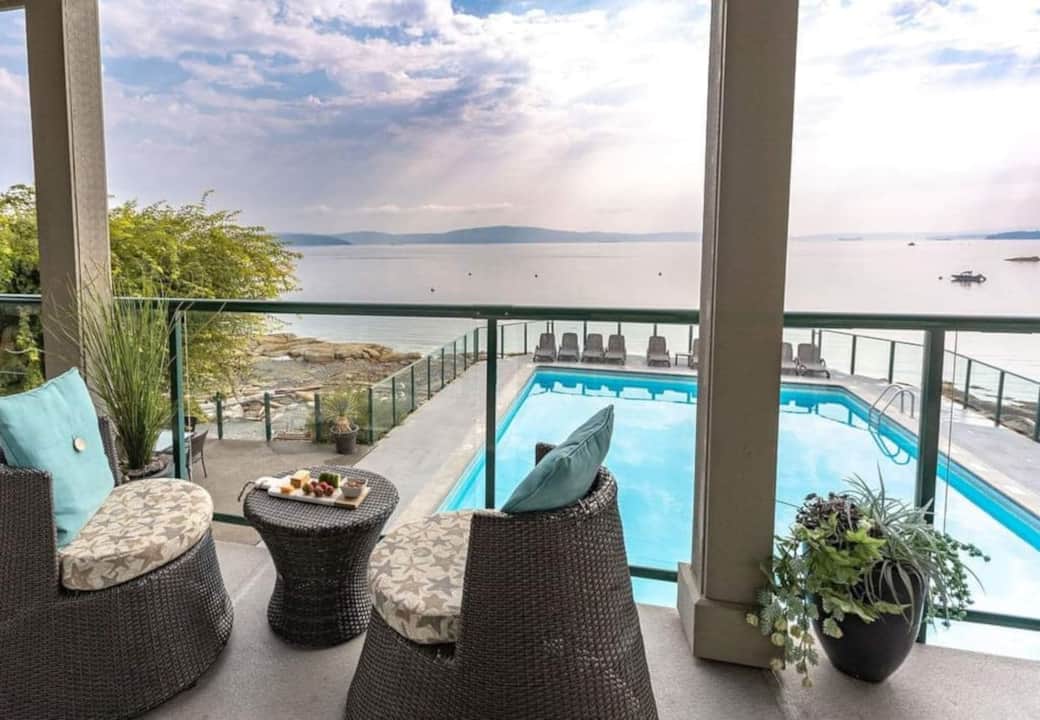 Private balcony + pool & ocean view Private balcony + pool & ocean view