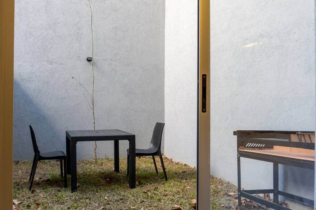 Patio con parrilla privada