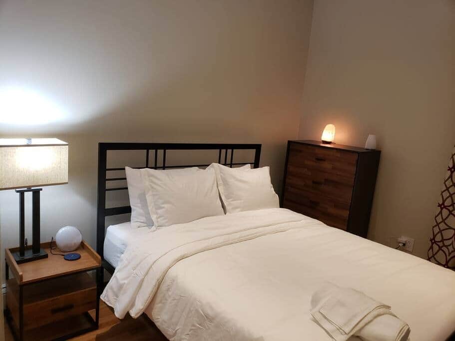 The Junction bathroom — hotel-style finishes in a furnished Brooklyn apartment near Broadway Junction