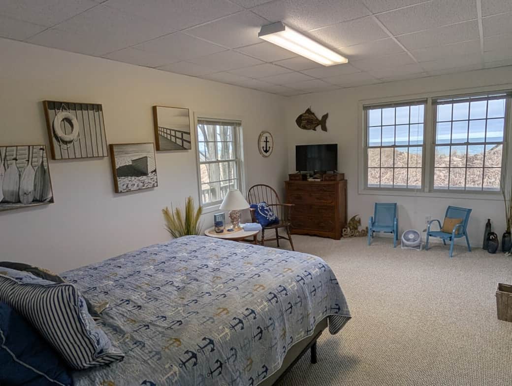 Main bedroom with gorgeous view of the dune and Lake Michigan. 
