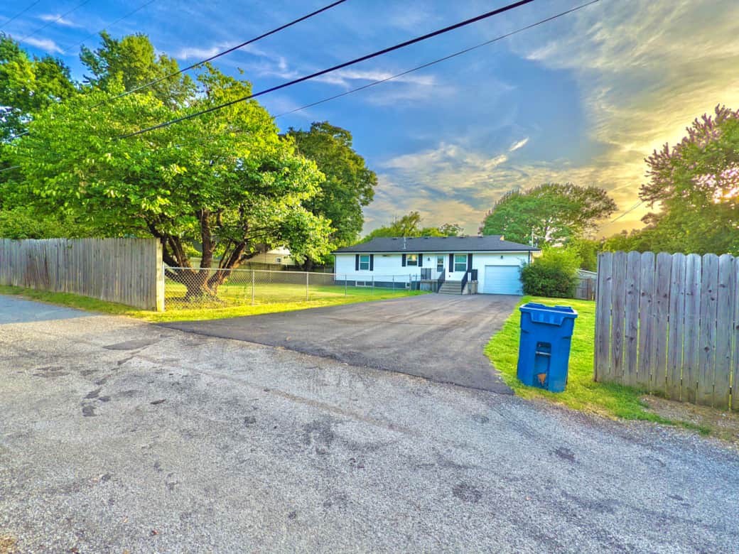 Private parking is accessible from the alley behind the house Private parking is accessible from the alley behind the house