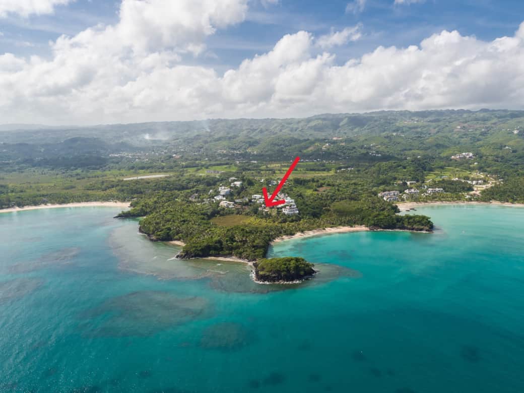 Aerial view of Casa Valentine perched above the ocean in Loma Bonita, Las Terrenas