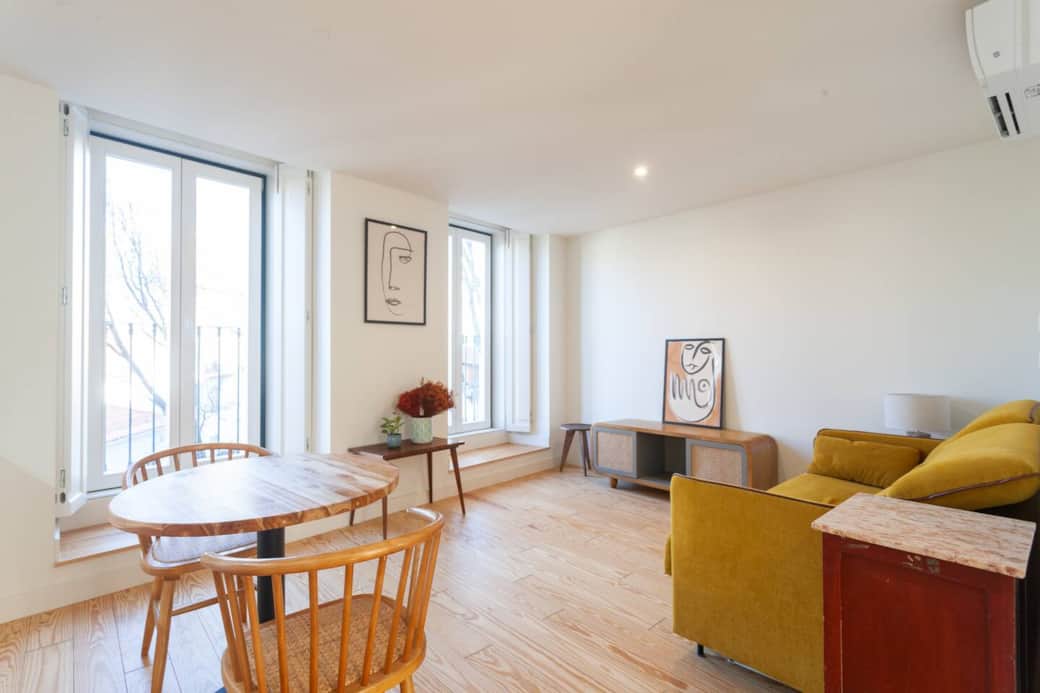 Two floor to ceiling double door windows really creates a wonderful feeling of openness and flow between inside and out. 