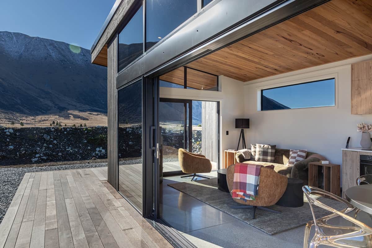 Enjoy the sun drenched living space and deck with seamless indoor - outdoor flow
