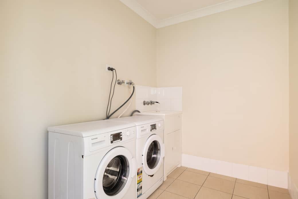 Shared Laundry Area: Washer available for convenient laundry needs