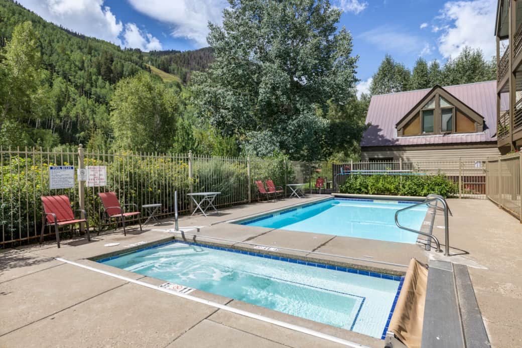 Outdoor heated pool and hot tub at Viking Lodge - a guest favorite!