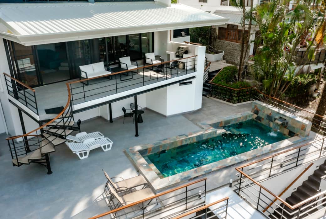 Private pool with lounge seating and covered outdoor areas designed for relaxing Private pool with lounge seating and covered outdoor areas designed for relaxing