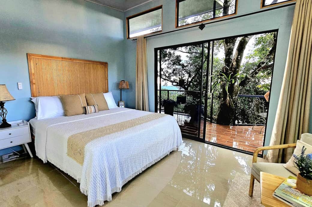 Enjoy a restful stay in this spacious room, perfect for couples. It features a comfortable king-sized bed, a private bathroom, and a generous closet. Wake up to the soothing sounds of nature and enjoy breakfast outdoors on the balcony.” Enjoy a restful stay in this spacious room, perfect for couples. It features a comfortable king-sized bed, a private bathroom, and a generous closet. Wake up to the soothing sounds of nature and enjoy breakfast outdoors on the balcony.”