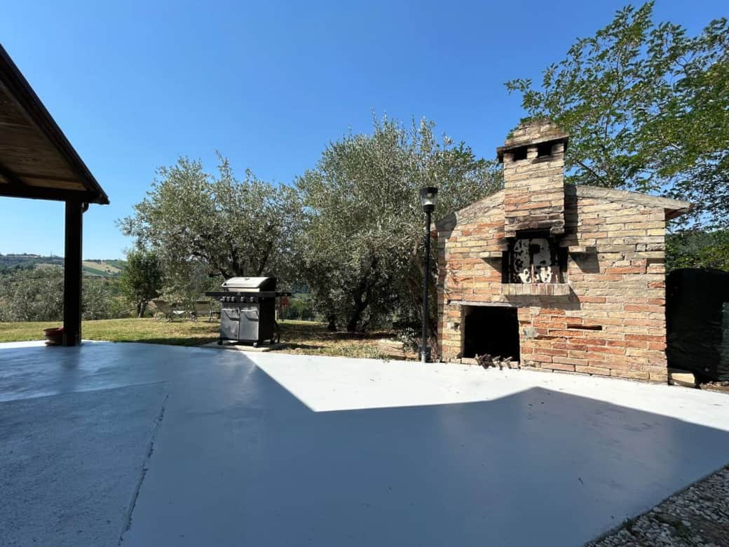 Gas BBQ and original stone pizza oven