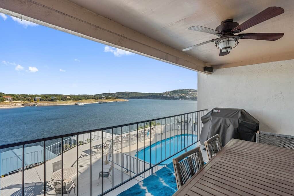 Covered patio with outdoor dining and grill with propane provided