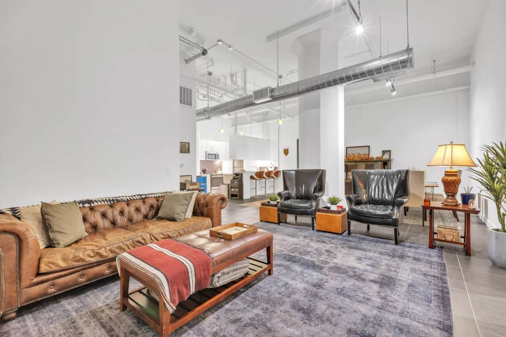 Stylish living room with a soft sofa and TV, perfect for relaxing at home.