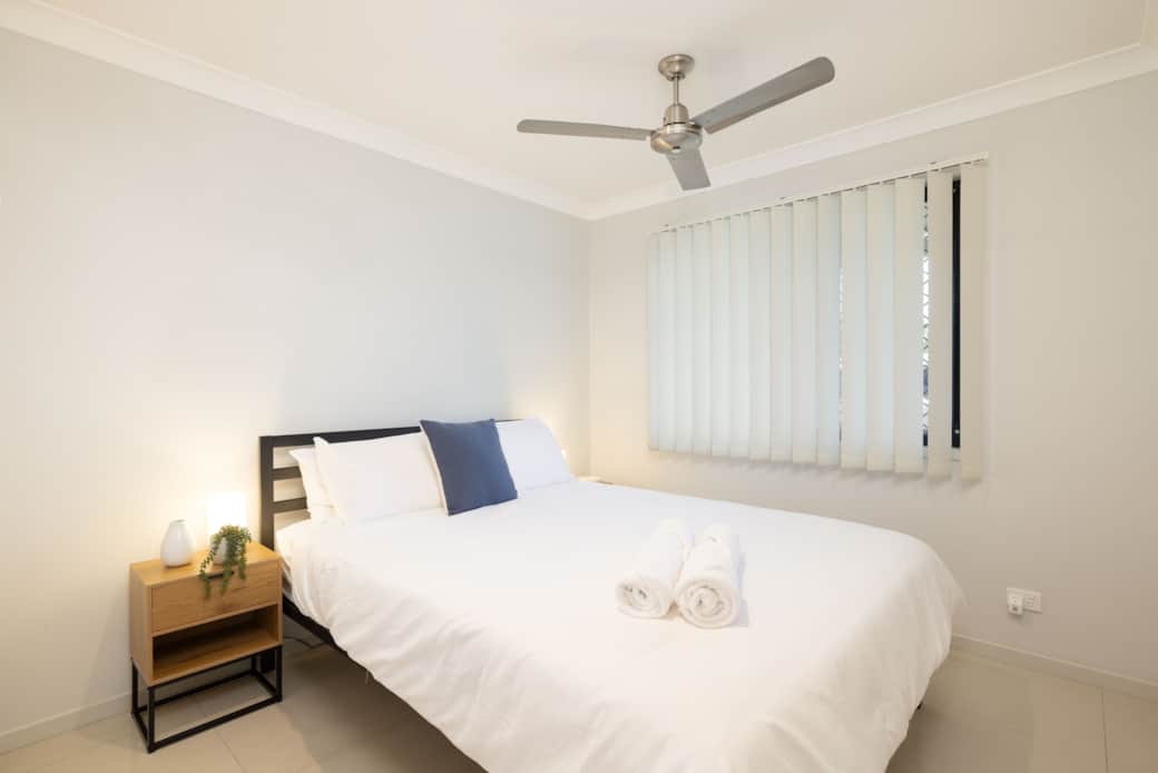 Bedroom 1: Peaceful bedroom with cozy design and ample storage