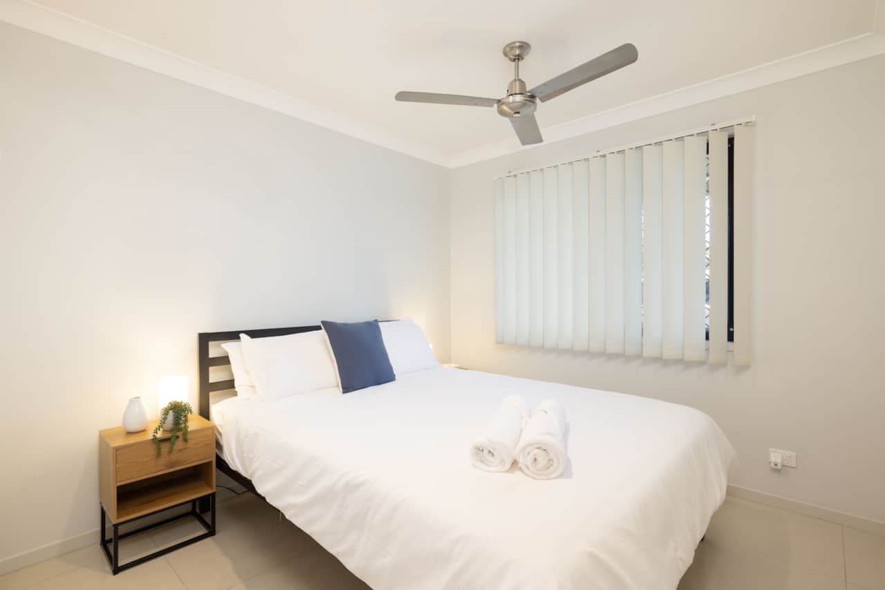 Bedroom 1: Peaceful bedroom with cozy design and ample storage