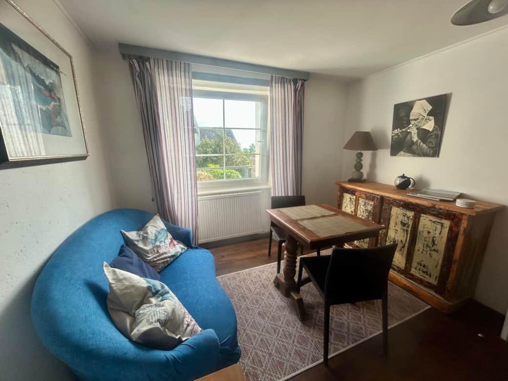 Admire the sea from the sofa downstairs