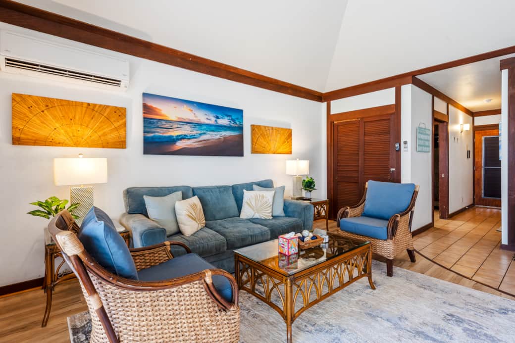 Seating Area - Step into this serene living space, where coastal vibes meet comfort.