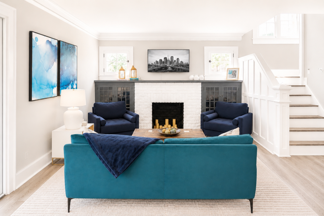 Cozy up by the original fireplace — a timeless centerpiece reimagined.