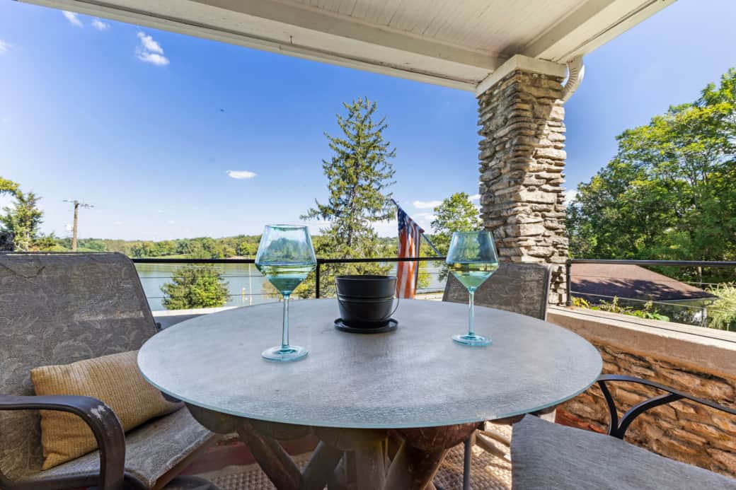 Enjoy hilltop scenic views from the covered porch.