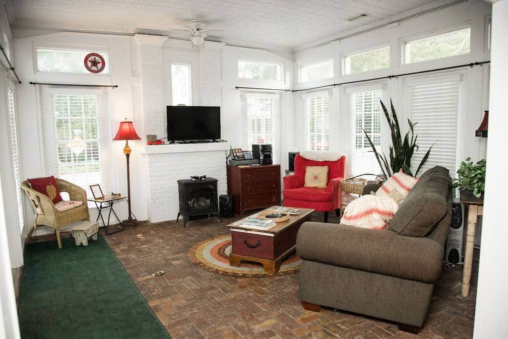 This living room offers plenty of seating to enjoy the cable TV.