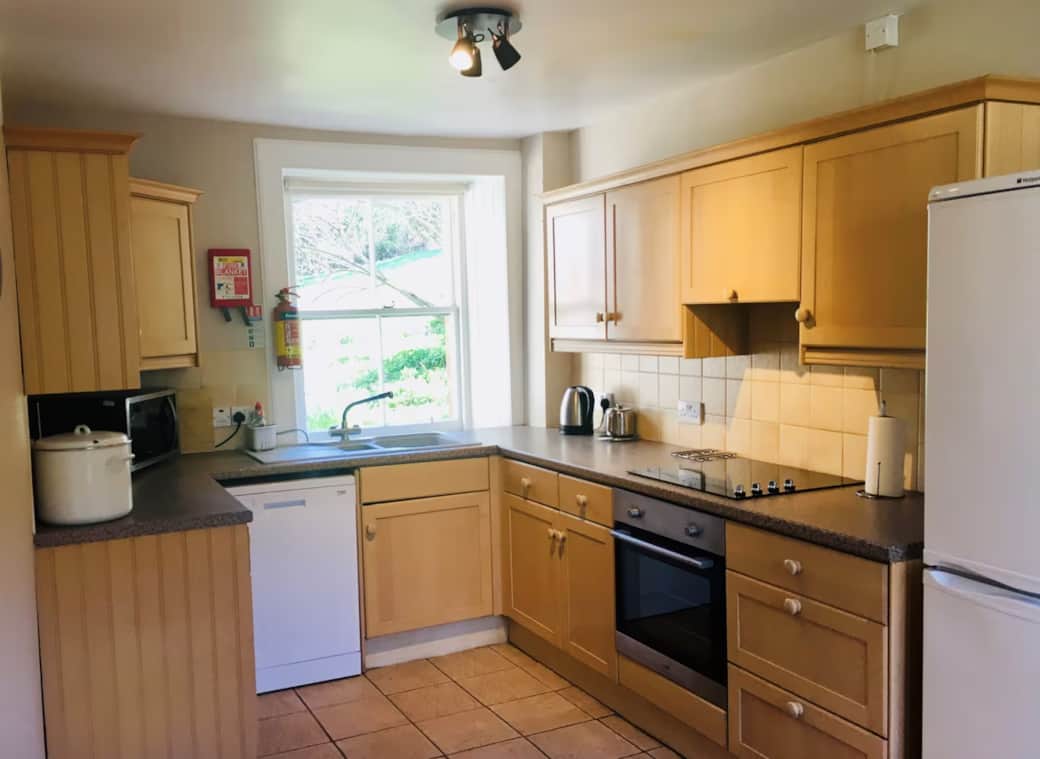 Beech Tree kitchen with view over garden and towards castle