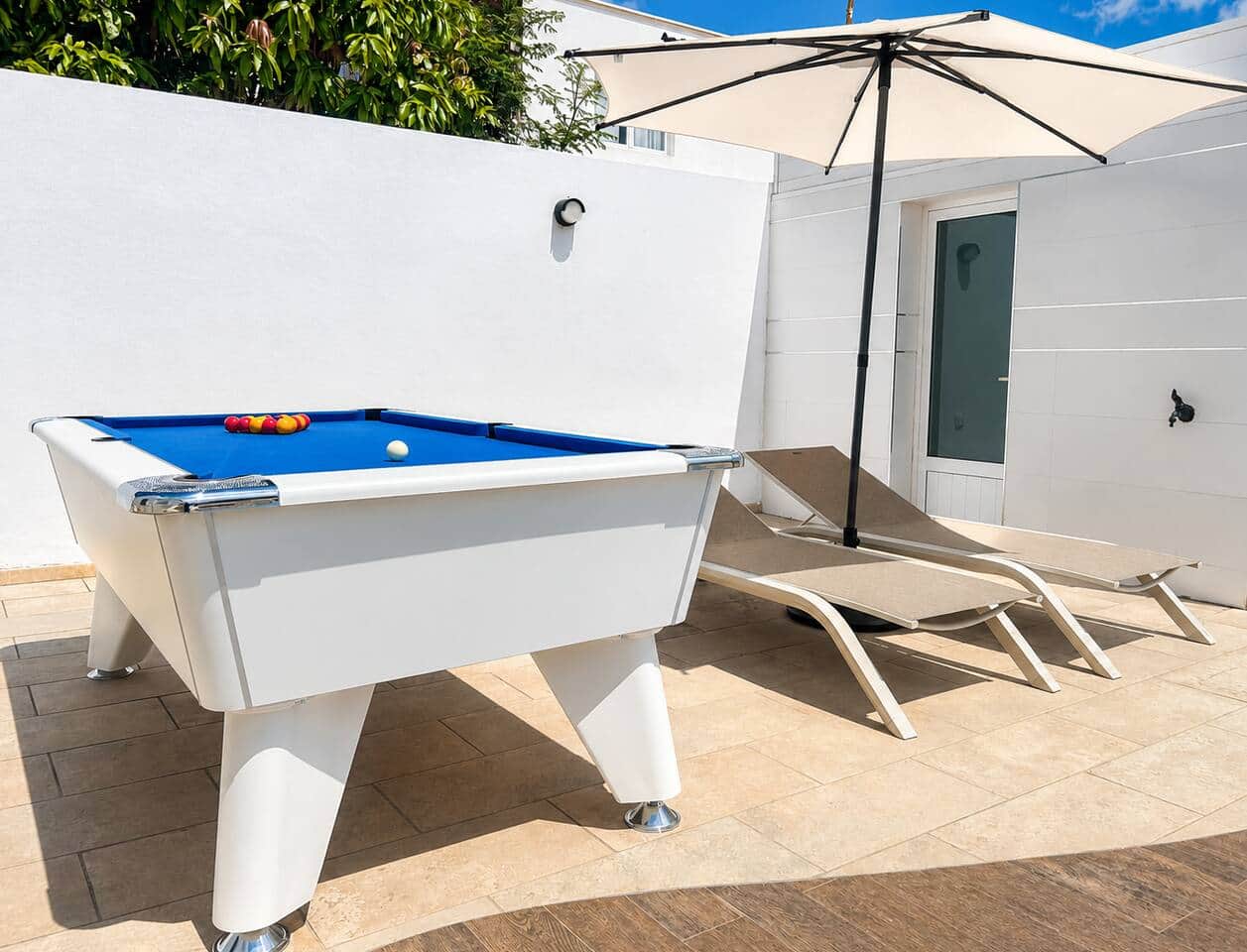 Poolside billiard table at Villa Tisalaya Puerto del Carmen, AZ Rentals