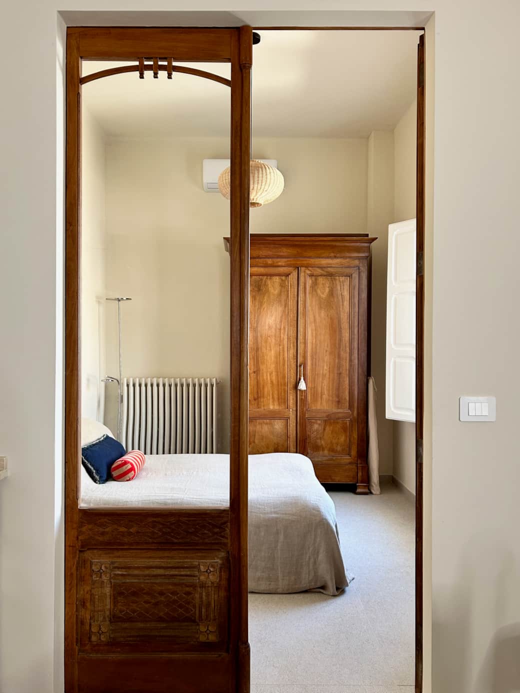 The lovingly restored antique door welcomes you to bedroom 2