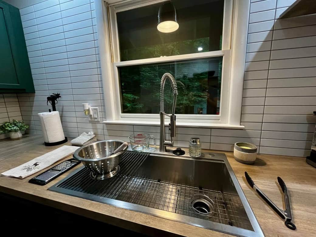 You'll enjoy using the newly installed farmhouse sink. There's plenty of space for meal prep and cleaning.
