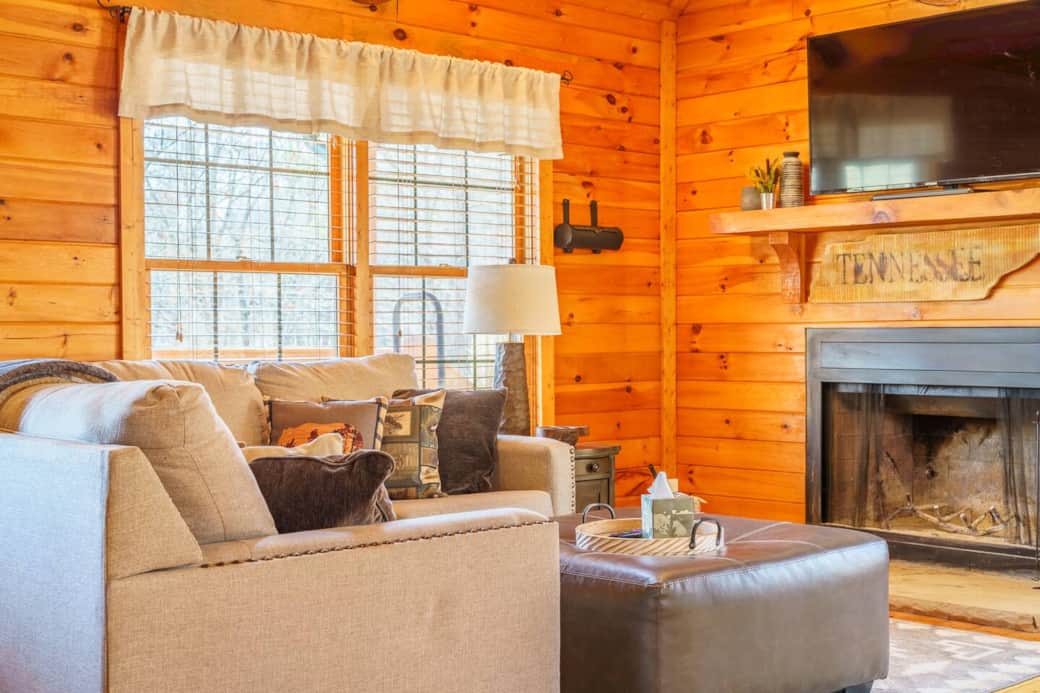 Close up on the L shaped couch close enough to cuddle up with a fire going while you watch your favorite shows on the many streaming services available.