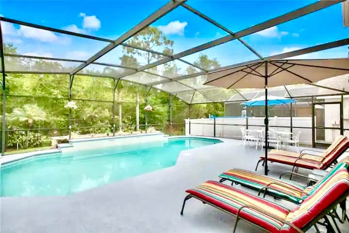 Beautiful pool with large deck area to enjoy lounging in the sun