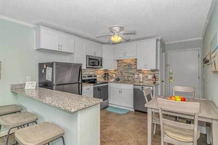Updated Kitchen featuring stainless steel appliances and granite countertops!
