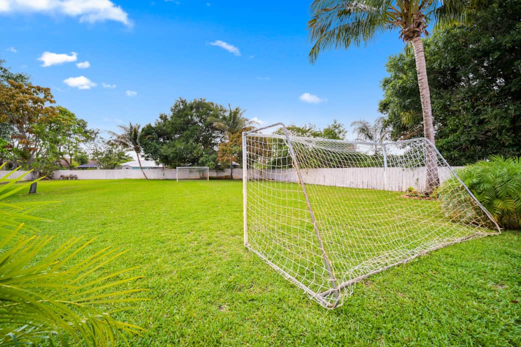 Soccer field in the spacious backyard.