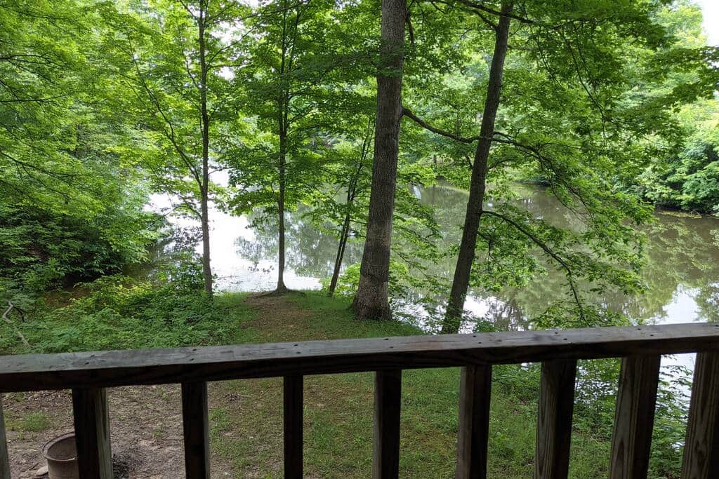 View of Pastor Baggett Lake from back porch of Cabin 7.