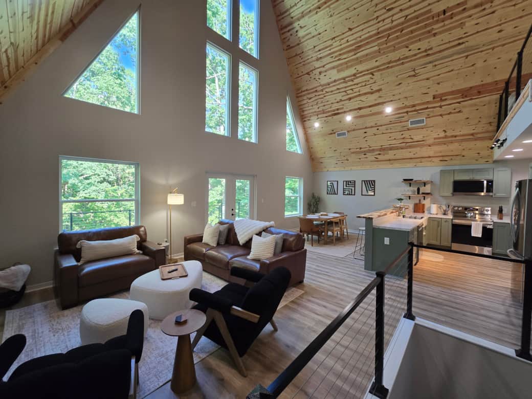 Soaring ceilings, massive windows, and cozy gathering spaces filled with natural light.
