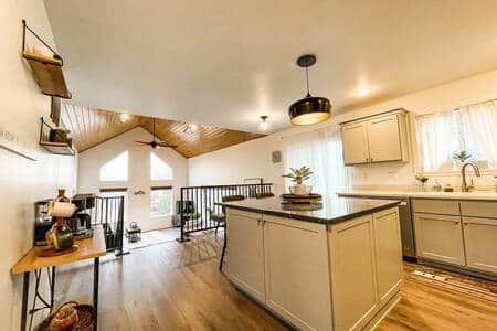 View of kitchen (right) and coffee bar (left) from the hallway.