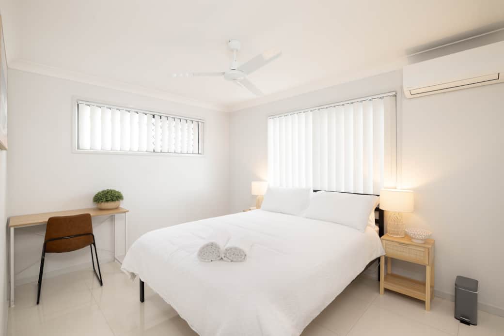 Bedroom: Peaceful bedroom with cozy design and ample storage 