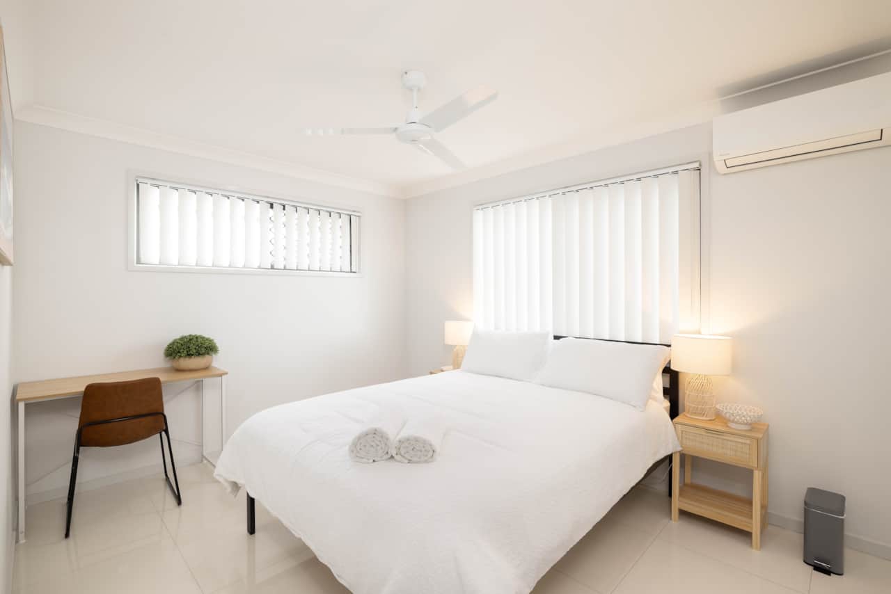 Bedroom: Peaceful bedroom with cozy design and ample storage 