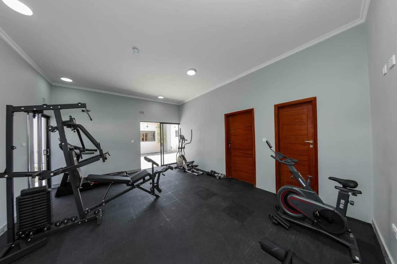 On-site fitness room with cardio and strength equipment 