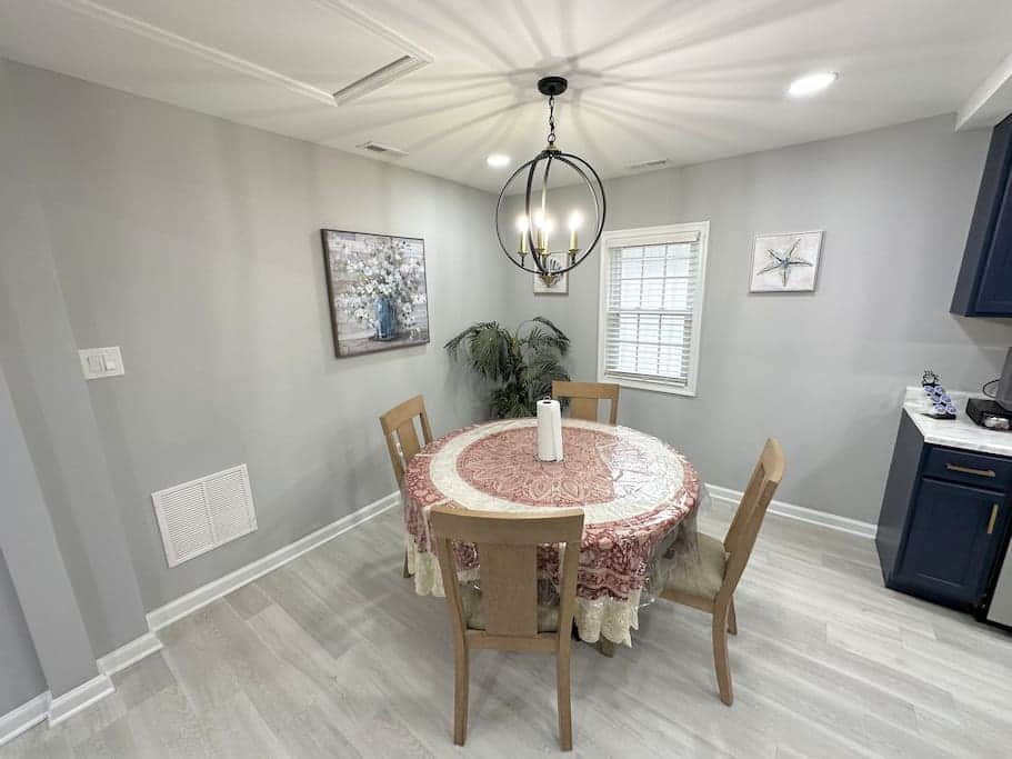 Dining area that seats 4 adults &amp; includes one kid high chair on the side (if needed)