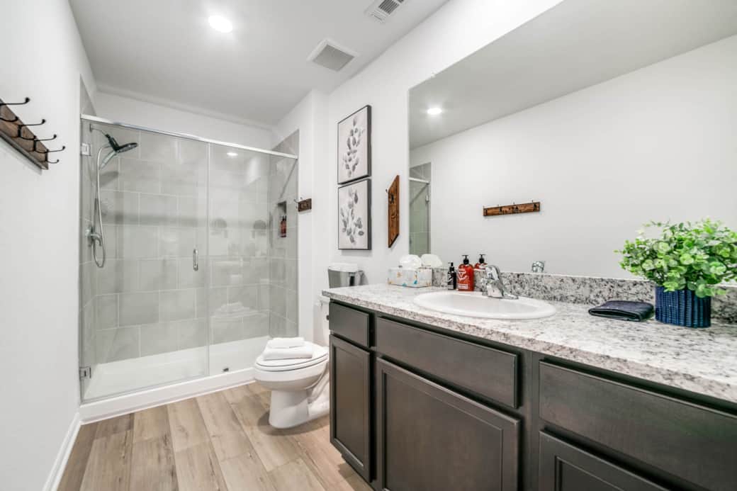 The King bedroom includes an en suite bathroom with a walk in shower