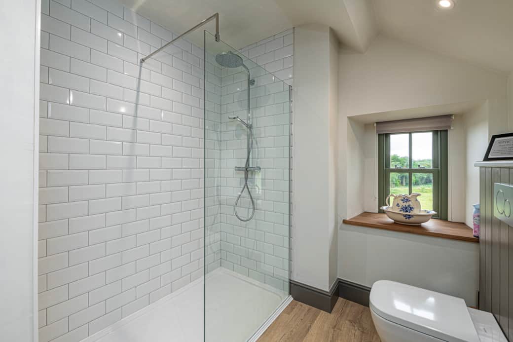 Main bathroom with large walk-in shower