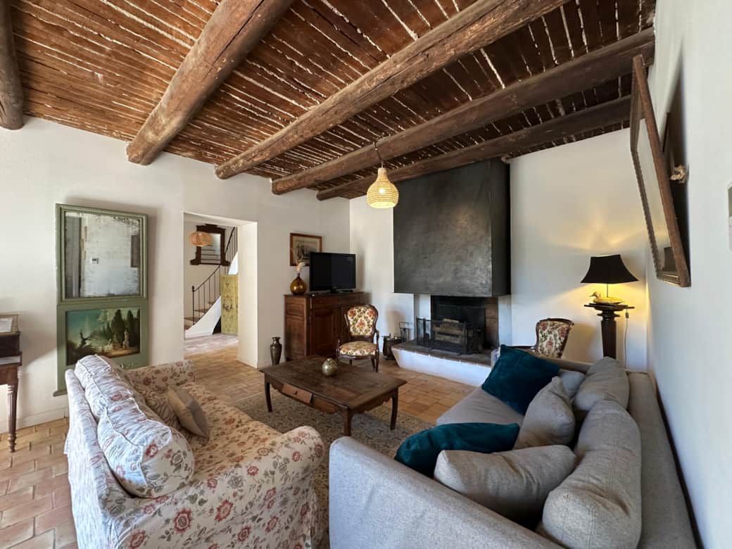 living room, sofa, TV, fireplace, table, decoration, mirror