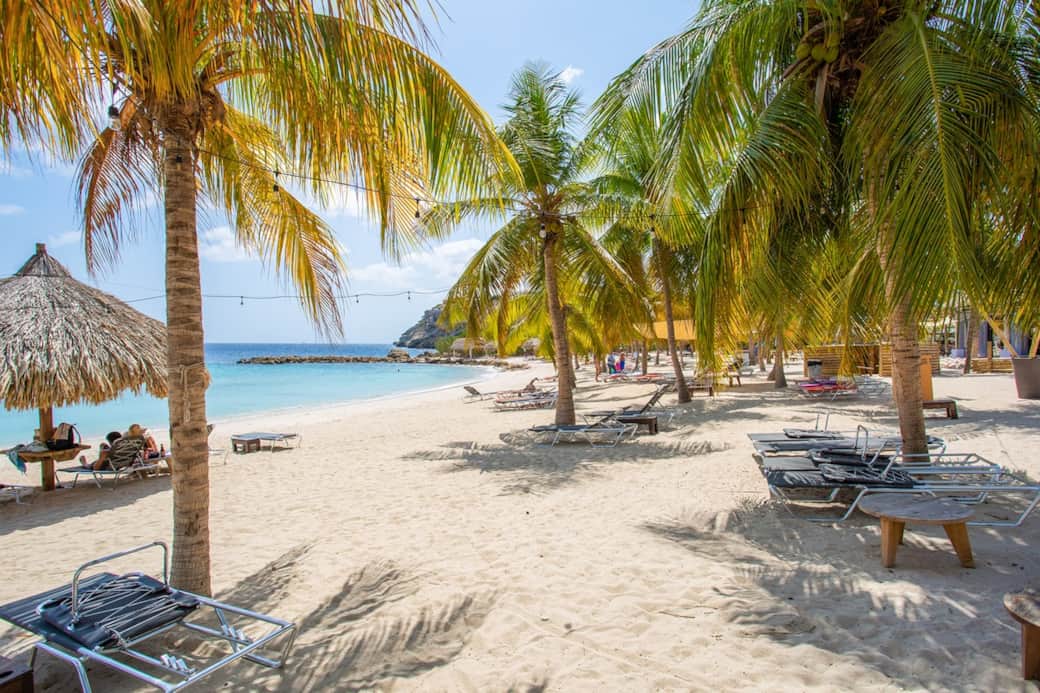 The beach of Blue Bay. The entrance to the beach and the use of the chairs is included in your stay The beach of Blue Bay. The entrance to the beach and the use of the chairs is included in your stay