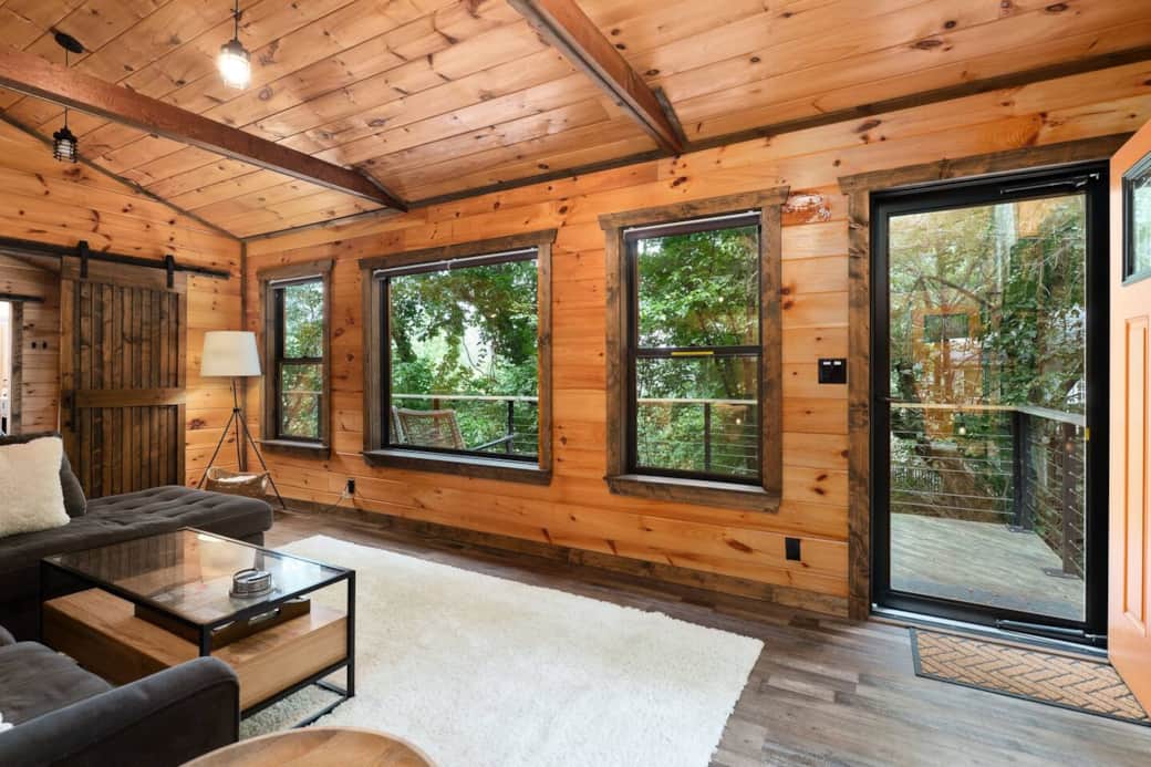 Vaulted windows with seasonal lake views and epic sunrises from the living space. Vaulted windows with seasonal lake views and epic sunrises from the living space.