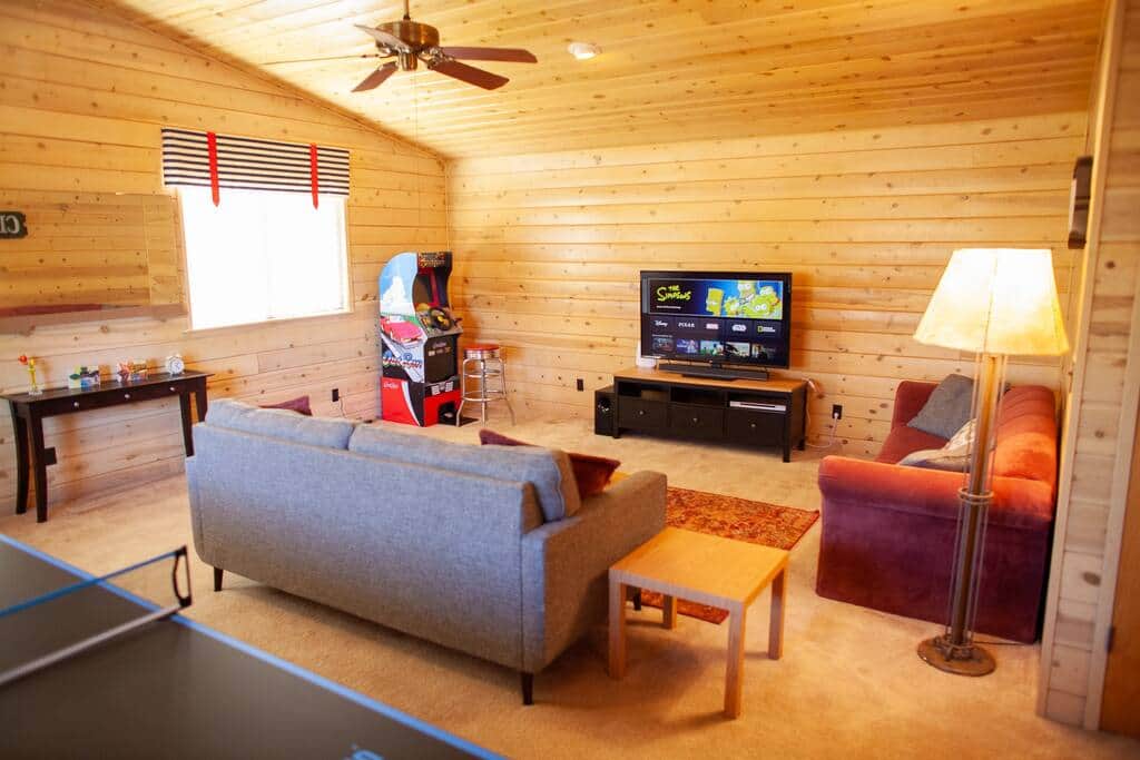 Game/TV room with ping pong, arcade game, and 4K smart TV! Game/TV room with ping pong, arcade game, and 4K smart TV!