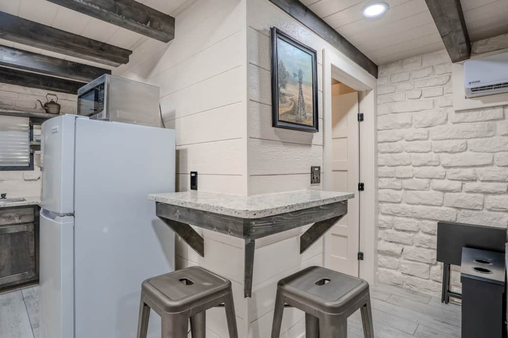 Kitchen bar top with stools 
